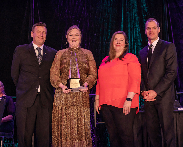 Courtney Hance, COO of The Branding Firm, accepting the Small Business of the Year award